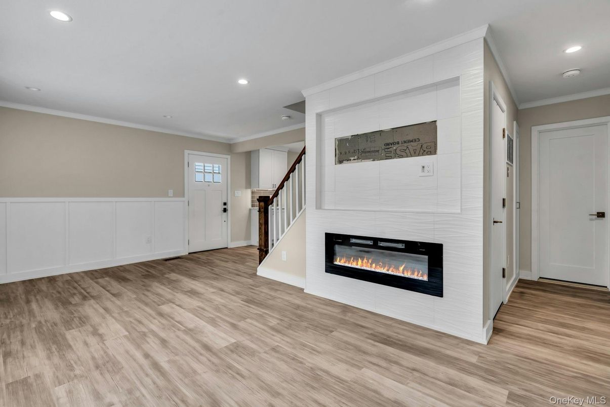 Empty room, Fireplace, Interior, Recessed Lighting, Wood Texture Flooring