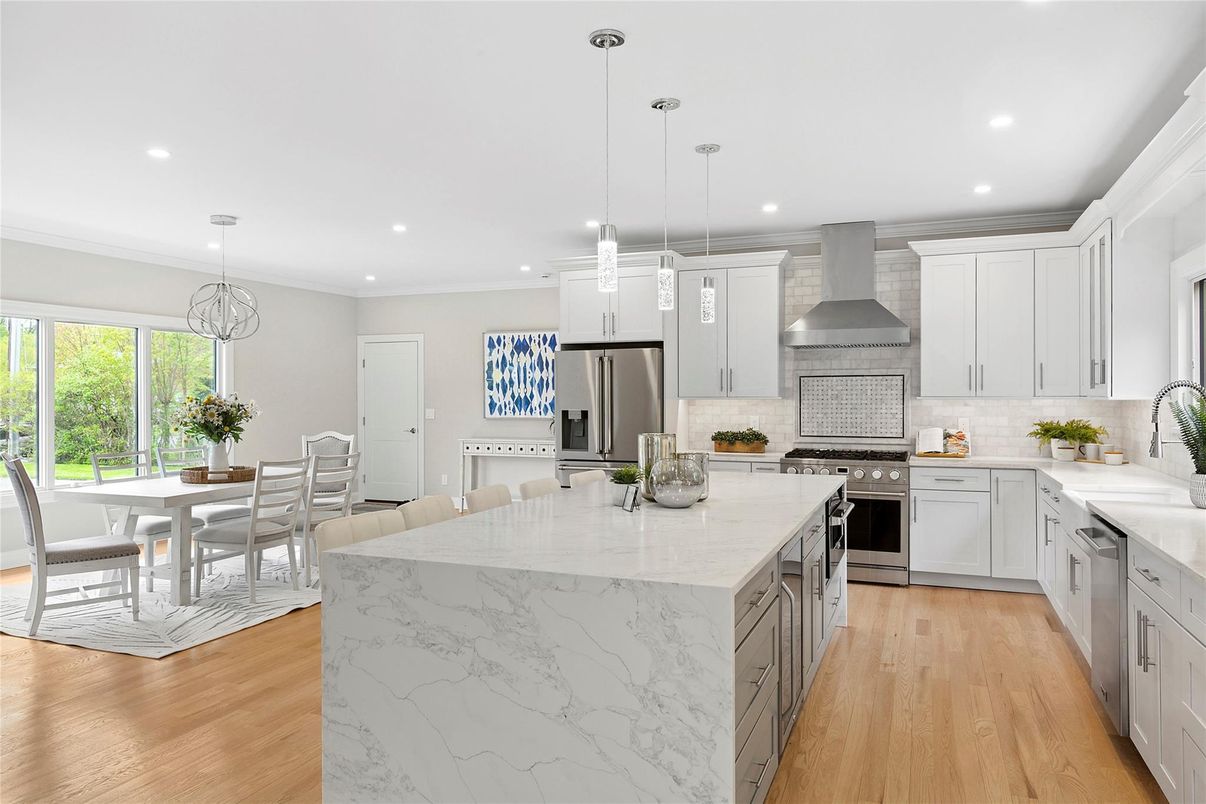 Dining room, Interior, Kitchen, Pendant Lights, Recessed Lighting, Stainless Steel Appliances, Wood Texture Flooring
