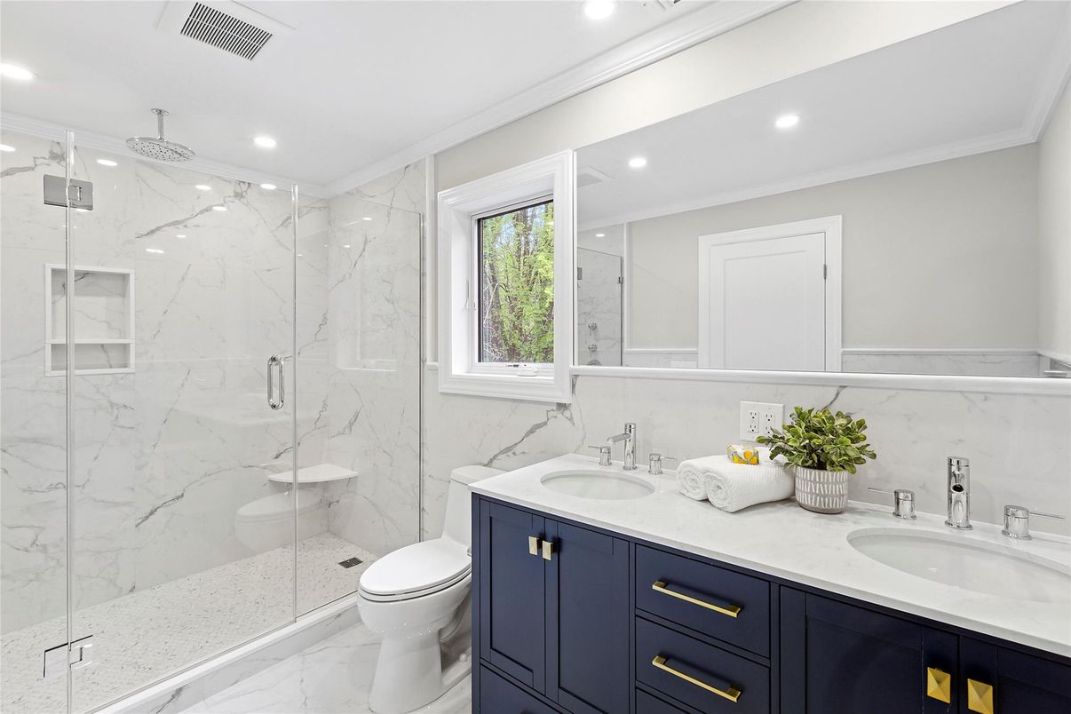 Bathroom, Dual Sink Vanities, Glass Shower, Interior, Marble, Marble Walls, Recessed Lighting