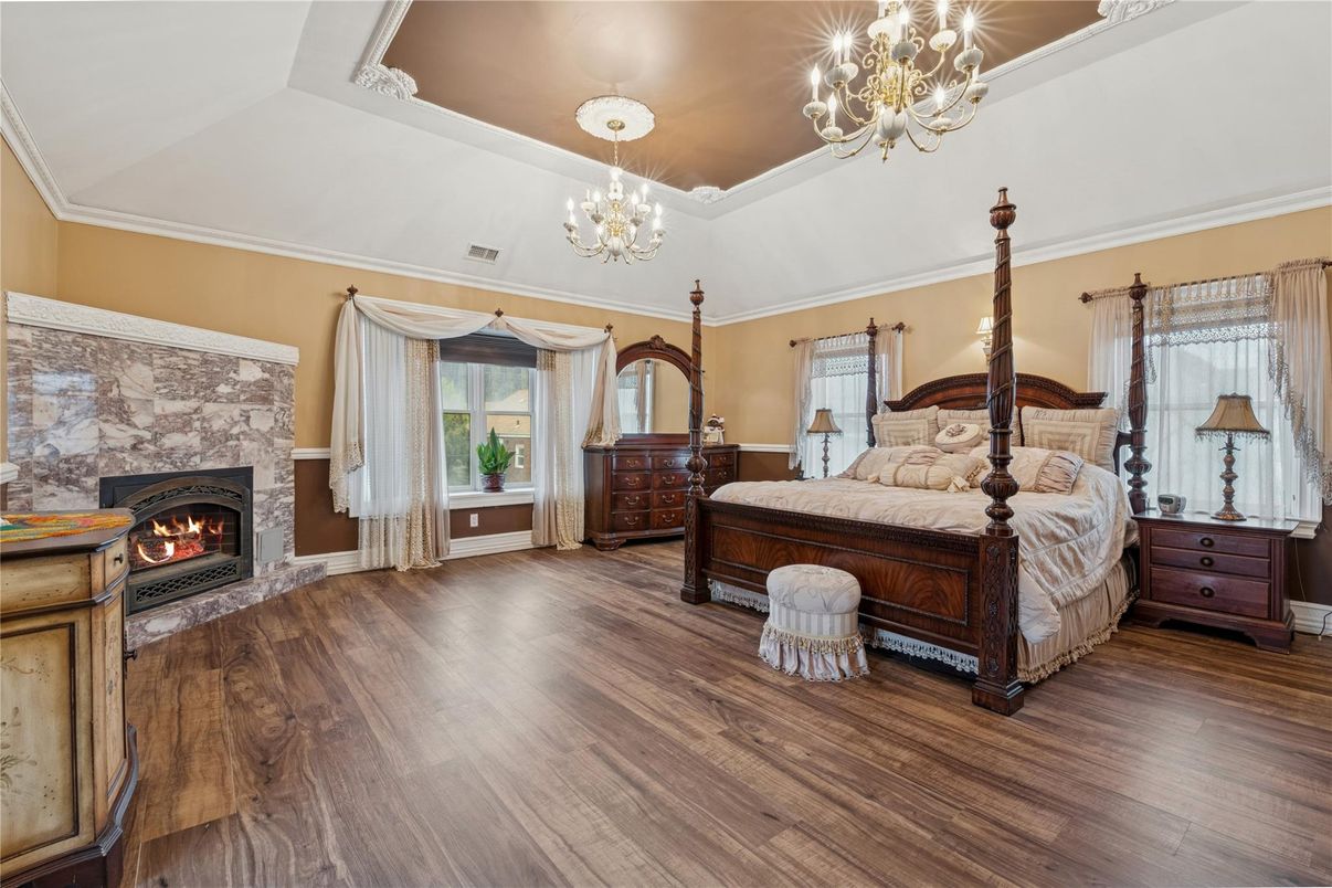 Bedroom, Chandelier, Fireplace, Interior, Wood Texture Flooring