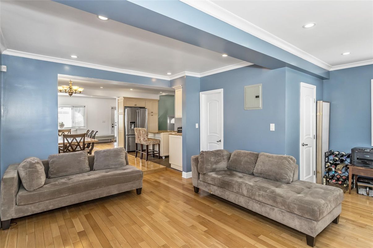 Chandelier, Dining room, Interior, Kitchen, Living room, Recessed Lighting, Stainless Steel Appliances, Wood Texture Flooring