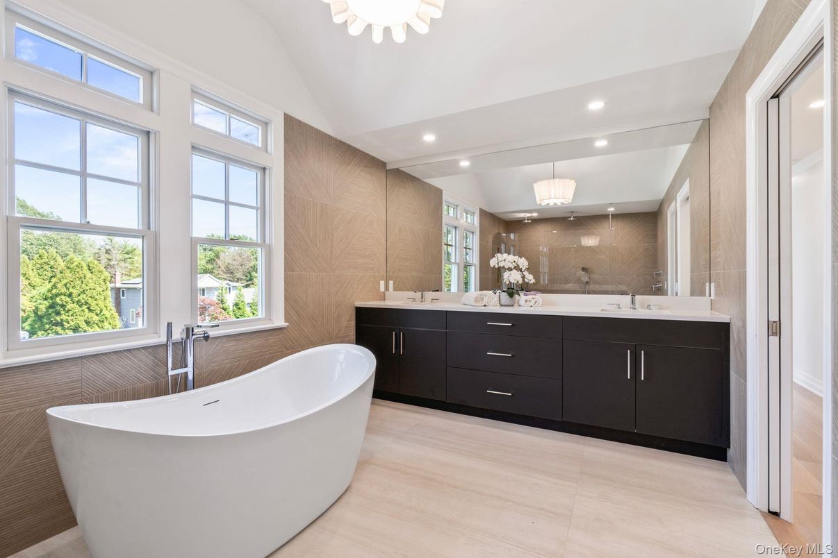 Bathroom, Dual Sink Vanities, Free Standing Baths, Interior, Pendant Lights, Recessed Lighting, Wood Texture Flooring