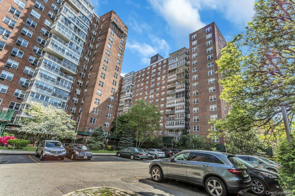 Exterior, Facade, Brick Facade, Condo Building