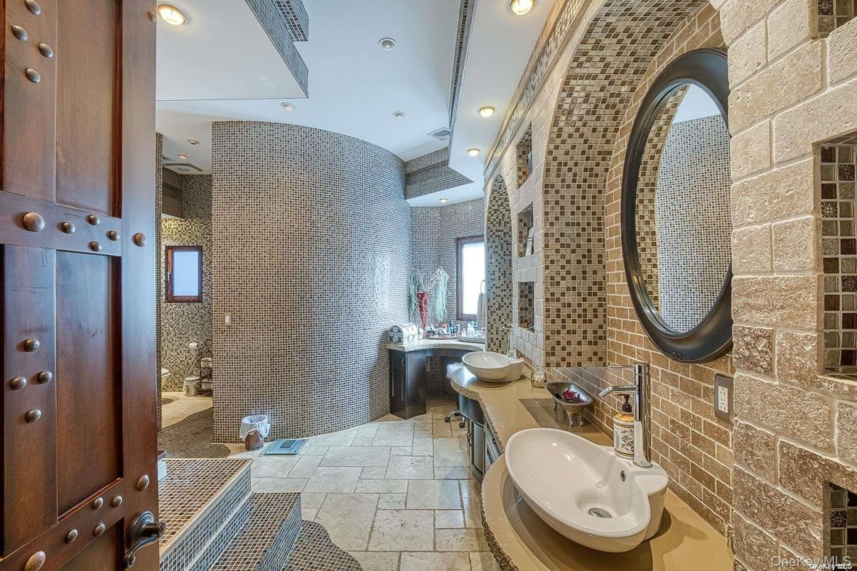 Bathroom, Dual Sink Vanities, Interior, Recessed Lighting, Stone Walls