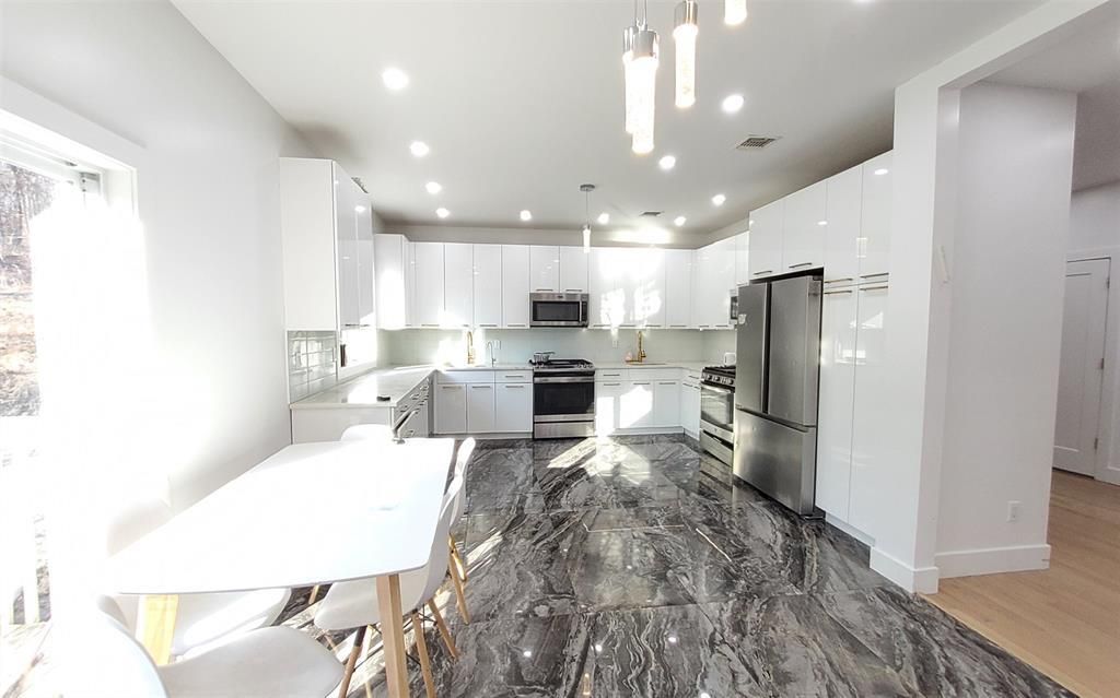 Interior, Kitchen, Marble, Pendant Lights, Recessed Lighting, Stainless Steel Appliances, Wood Texture Flooring