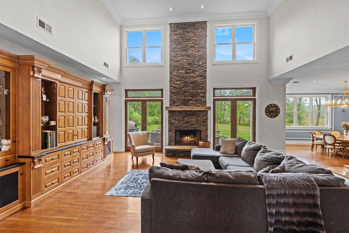 Chandelier, Dining room, Fireplace, Interior, Living room, Recessed Lighting, Wood Texture Flooring