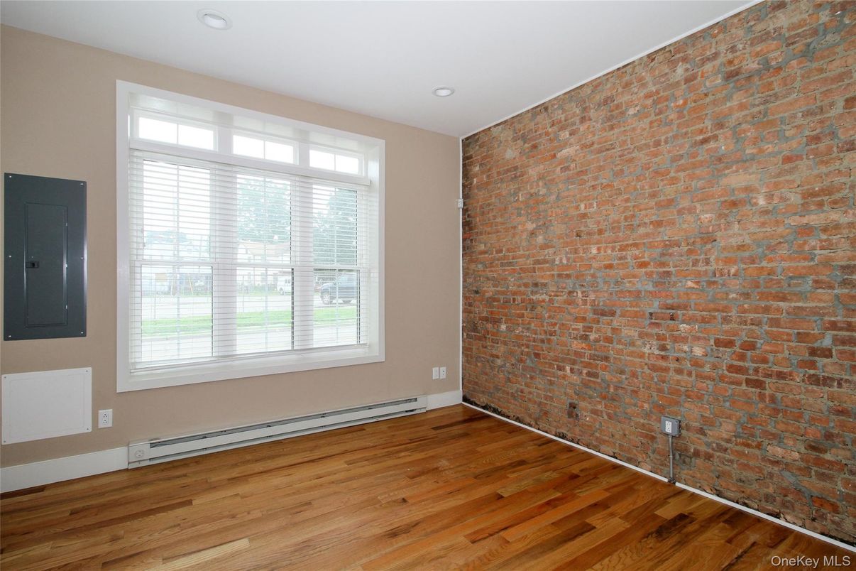 Empty room, Interior, Recessed Lighting, Stone Walls, Wood Texture Flooring
