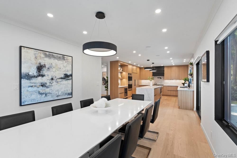Dining room, Interior, Kitchen, Pendant Lights, Recessed Lighting, Stainless Steel Appliances, Wood Texture Flooring