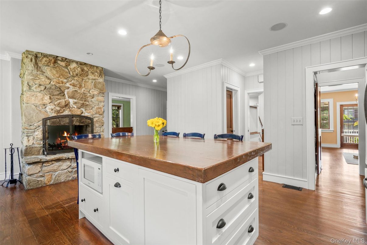 Fireplace, Interior, Kitchen, Pendant Lights, Recessed Lighting, Stone Walls, Wood Texture Flooring