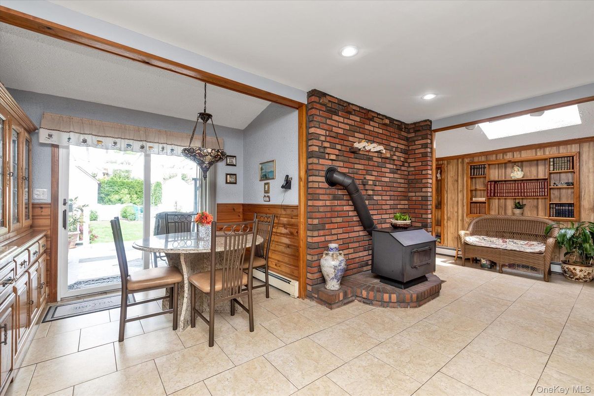 Dining room, Fireplace, Interior, Pendant Lights, Recessed Lighting, Stone Walls, Wooden Walls