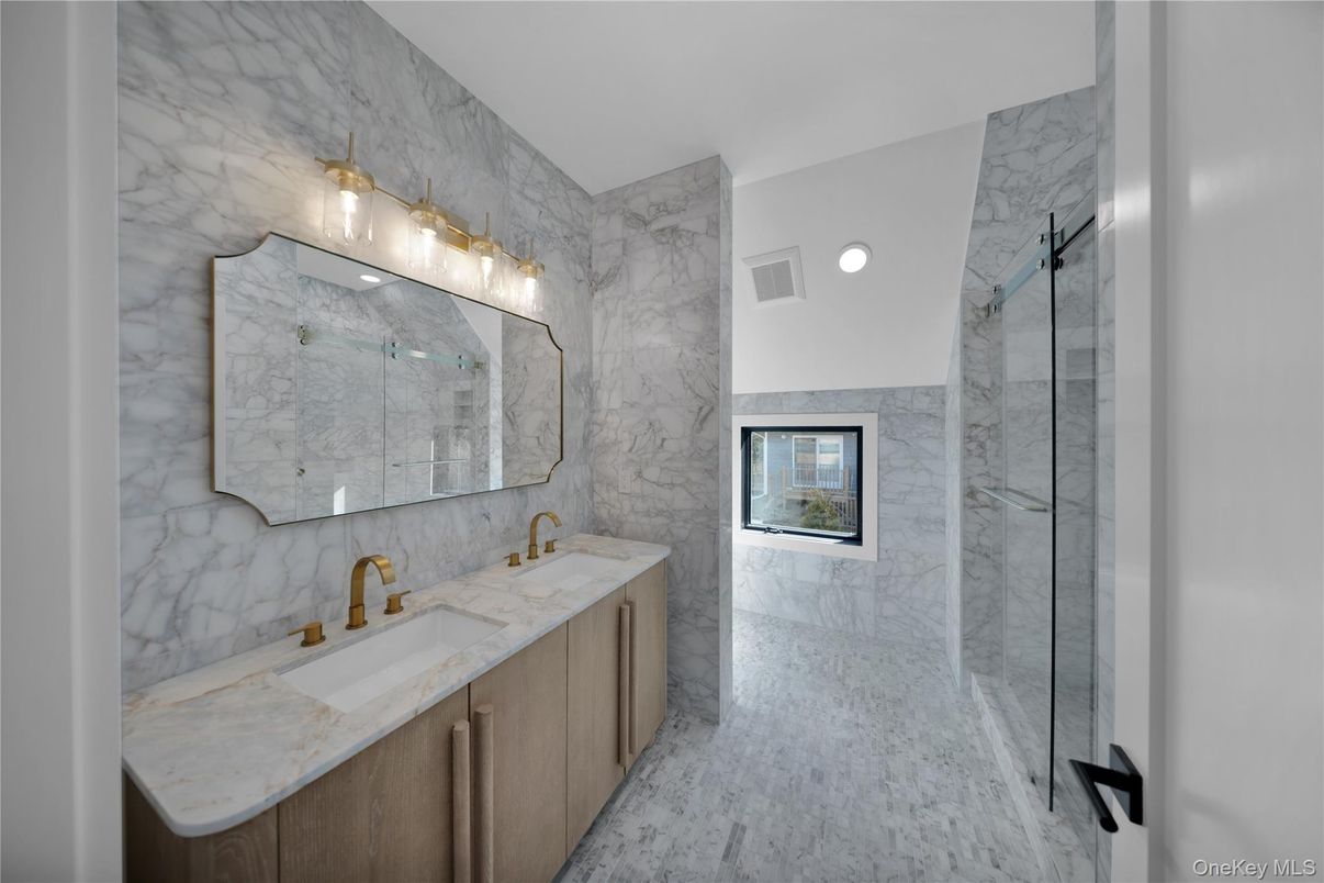 Bathroom, Dual Sink Vanities, Glass Shower, Interior, Marble, Marble Walls