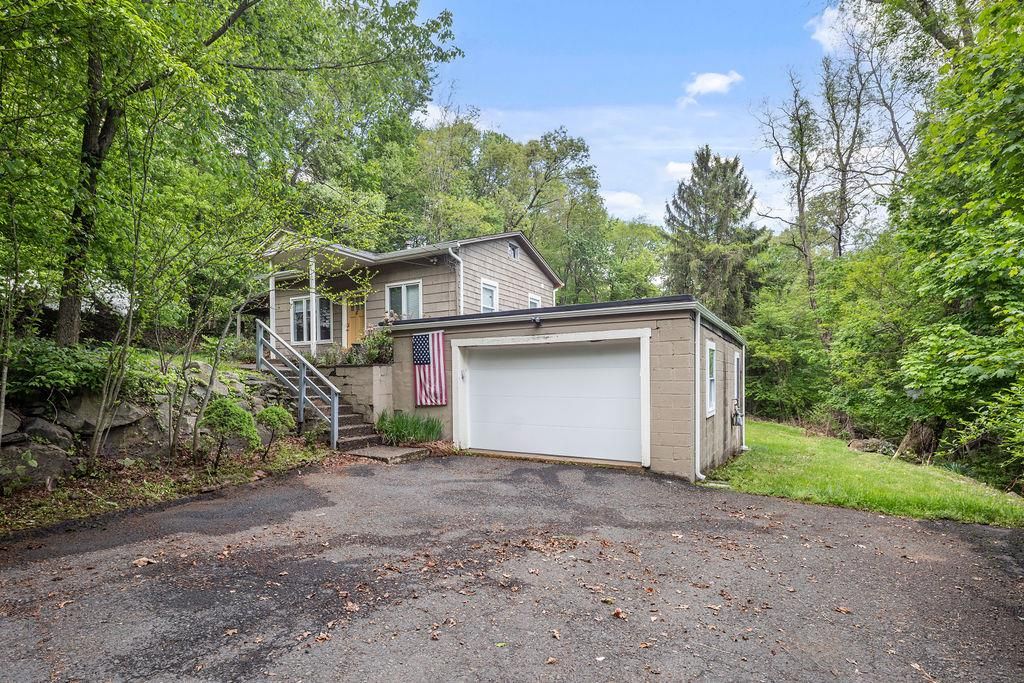 Attached, Exterior, Facade, Brick Facade, None