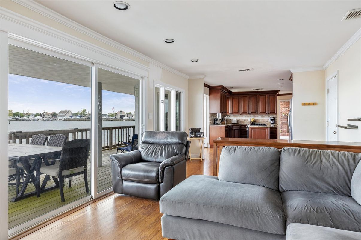 Interior, Kitchen, Living room, Recessed Lighting, Stainless Steel Appliances, Water, Wood Texture Flooring
