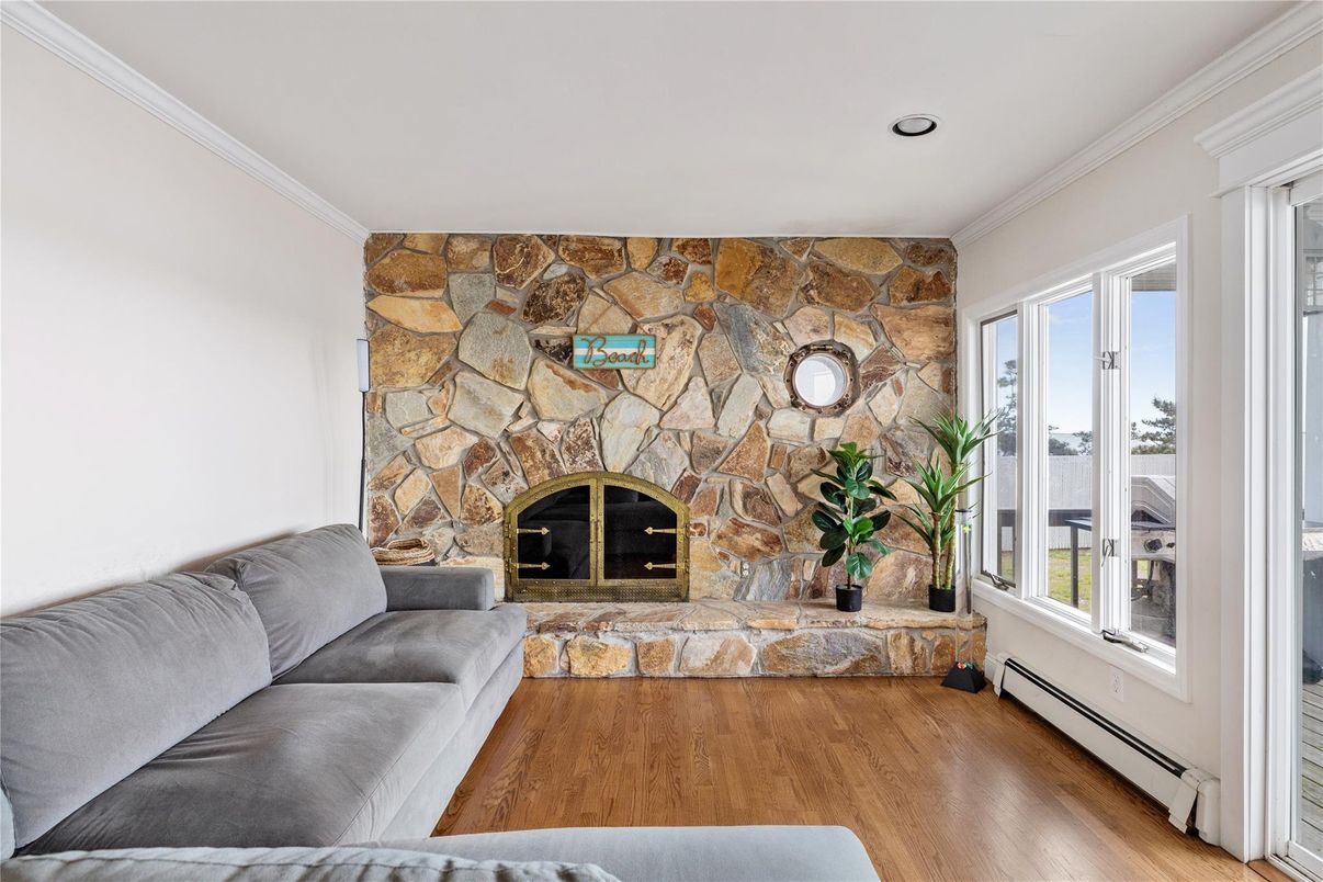 Fireplace, Interior, Recessed Lighting, Stone Walls, Wood Texture Flooring