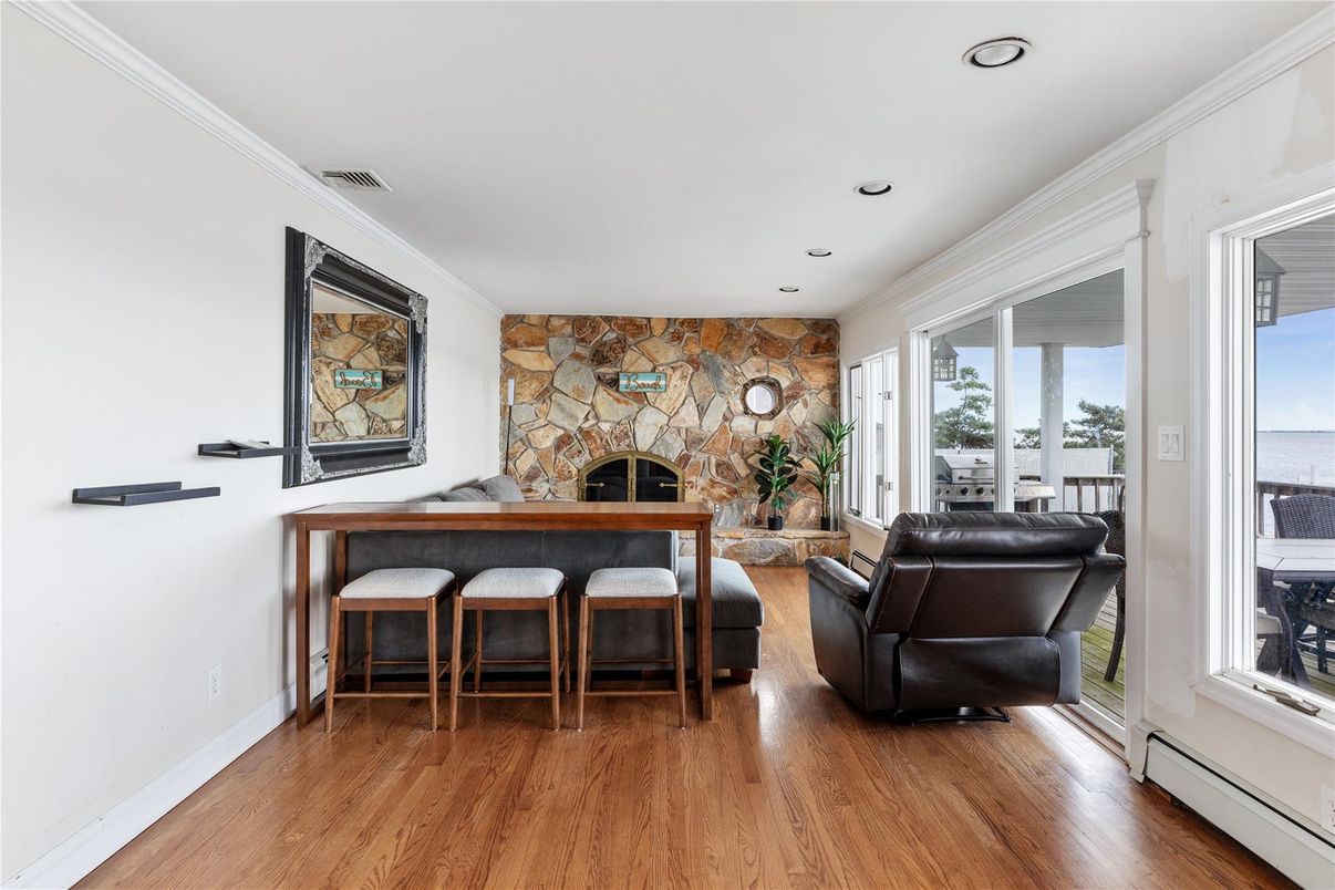 Fireplace, Interior, Recessed Lighting, Stone Walls, Wood Texture Flooring