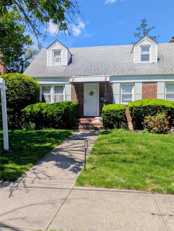 Exterior, Facade, Brick Facade, Cape Cod