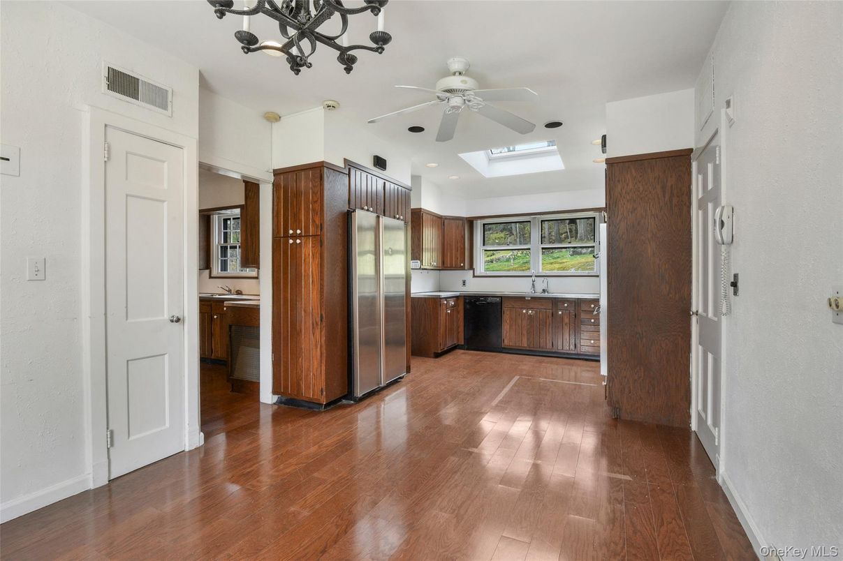 Chandelier, Interior, Kitchen, Recessed Lighting, Stainless Steel Appliances, Wood Texture Flooring