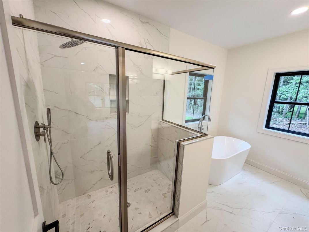 Bathroom, Free Standing Baths, Glass Shower, Interior, Marble, Marble Walls, Recessed Lighting