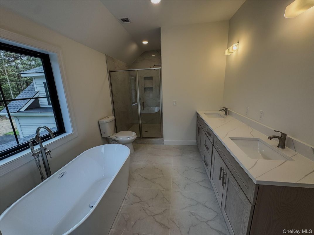 Bathroom, Dual Sink Vanities, Free Standing Baths, Glass Shower, Interior, Marble, Recessed Lighting
