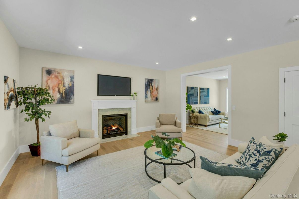 Fireplace, Interior, Living room, Recessed Lighting, Wood Texture Flooring
