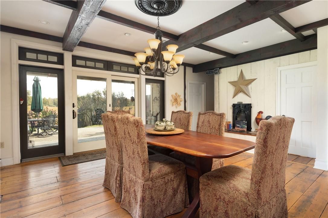 Chandelier, Dining room, Fireplace, Interior, Recessed Lighting, Wooden Beams, Wood Texture Flooring
