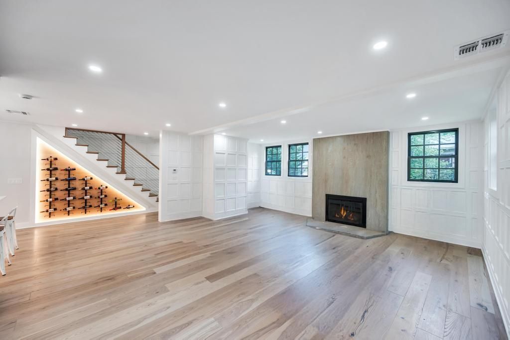 Empty room, Fireplace, Interior, Recessed Lighting, Wine Storage, Wood Texture Flooring