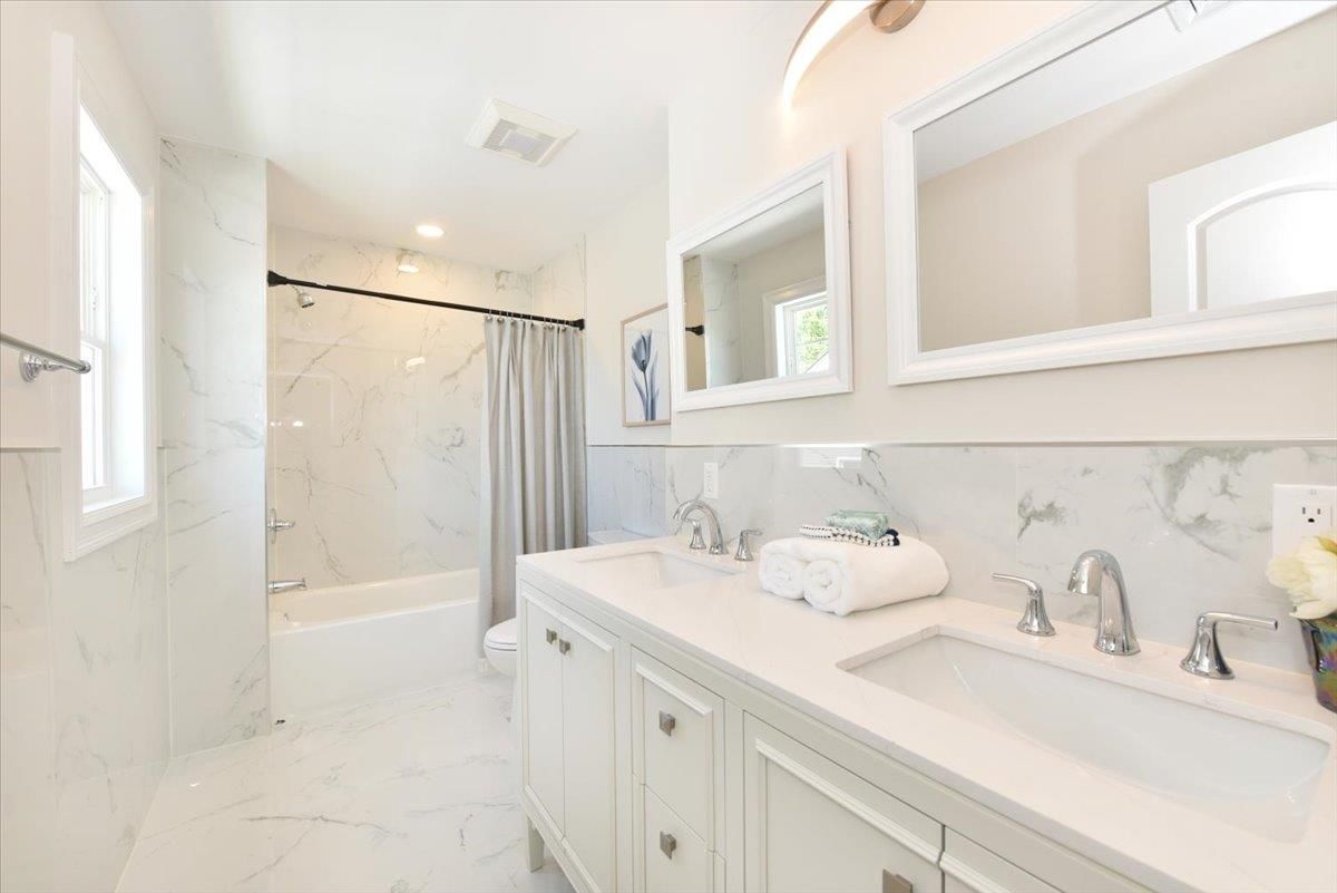 Bathroom, Dual Sink Vanities, Interior, Marble, Marble Walls, Recessed Lighting