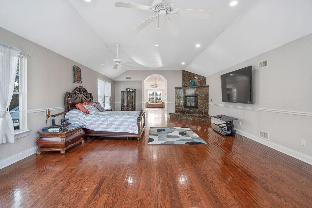 Bedroom, Fireplace, Interior, Recessed Lighting, Wood Texture Flooring