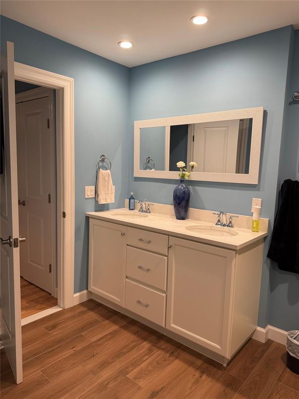 Bathroom, Dual Sink Vanities, Interior, Recessed Lighting, Wood Texture Flooring