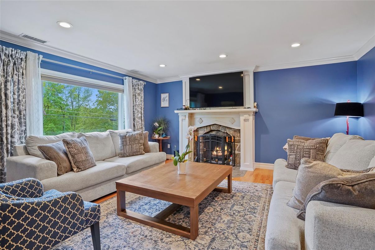 Fireplace, Interior, Living room, Recessed Lighting, Wood Texture Flooring