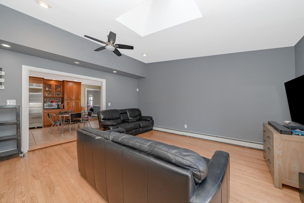 Dining room, Interior, Kitchen, Living room, Recessed Lighting, Stainless Steel Appliances, Wood Texture Flooring