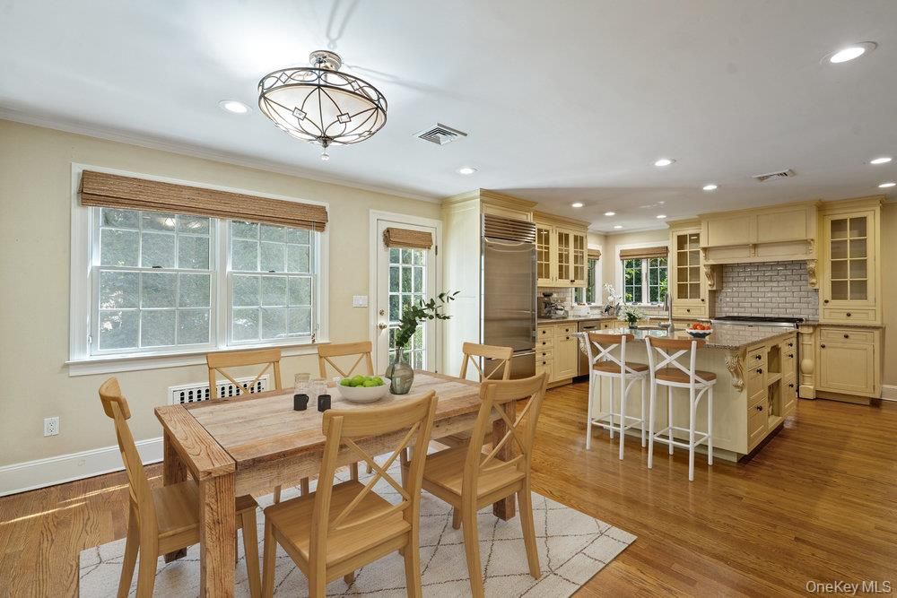 Dining room, Interior, Kitchen, Recessed Lighting, Stainless Steel Appliances, Wood Texture Flooring