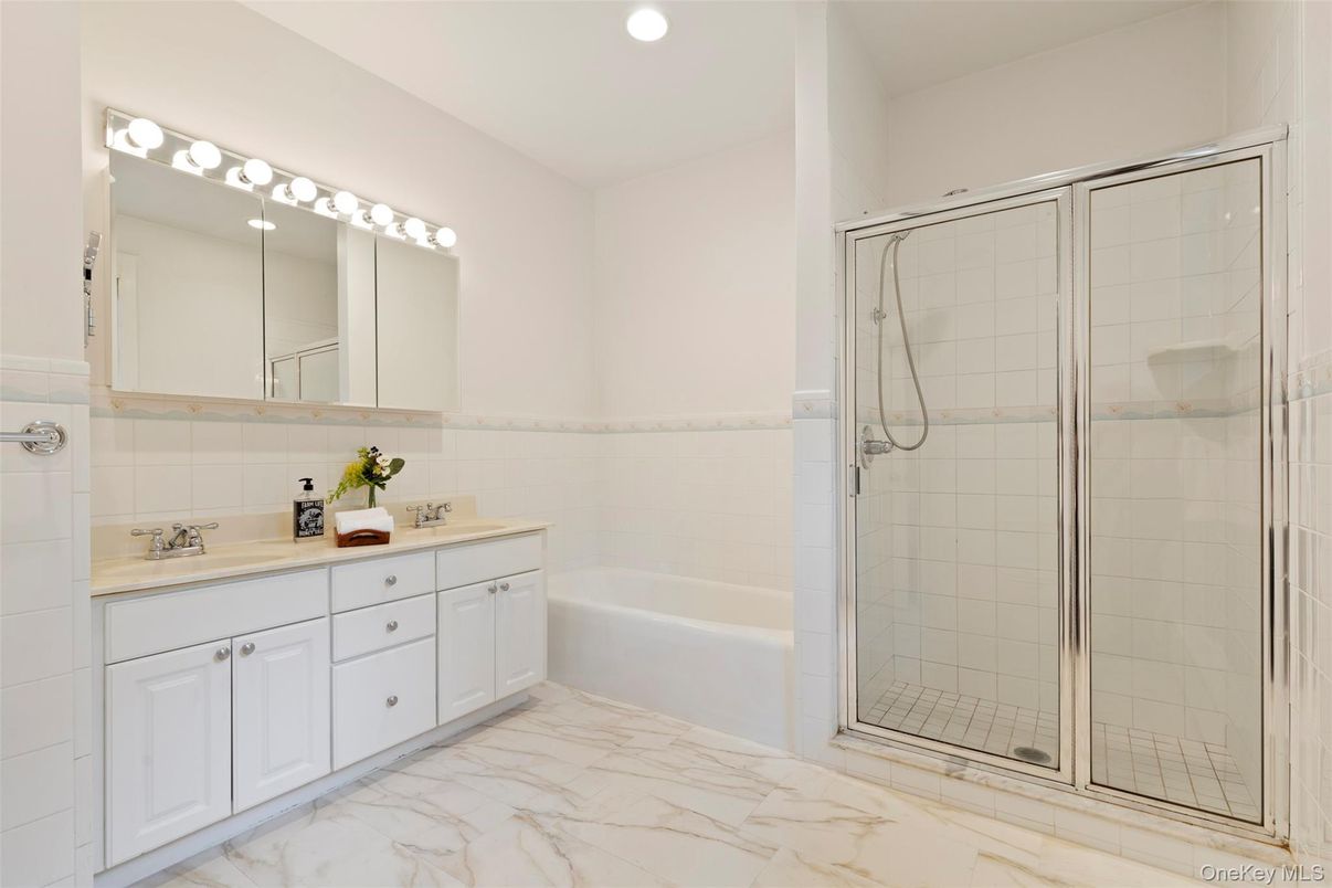 Bathroom, Dual Sink Vanities, Glass Shower, Interior, Marble, Recessed Lighting