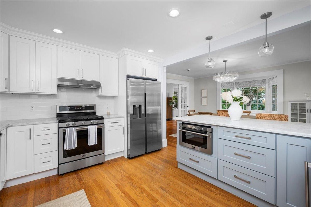 Chandelier, Interior, Kitchen, Pendant Lights, Recessed Lighting, Stainless Steel Appliances, Wood Texture Flooring