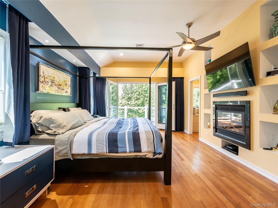 Bedroom, Fireplace, Interior, Recessed Lighting, Wood Texture Flooring