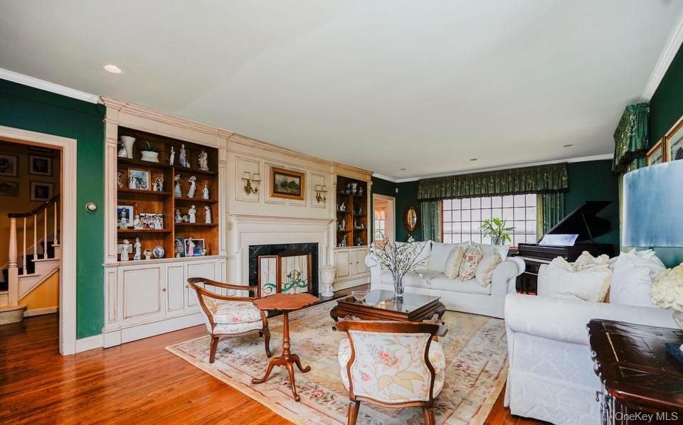 Fireplace, Interior, Living room, Piano, Recessed Lighting, Wood Texture Flooring