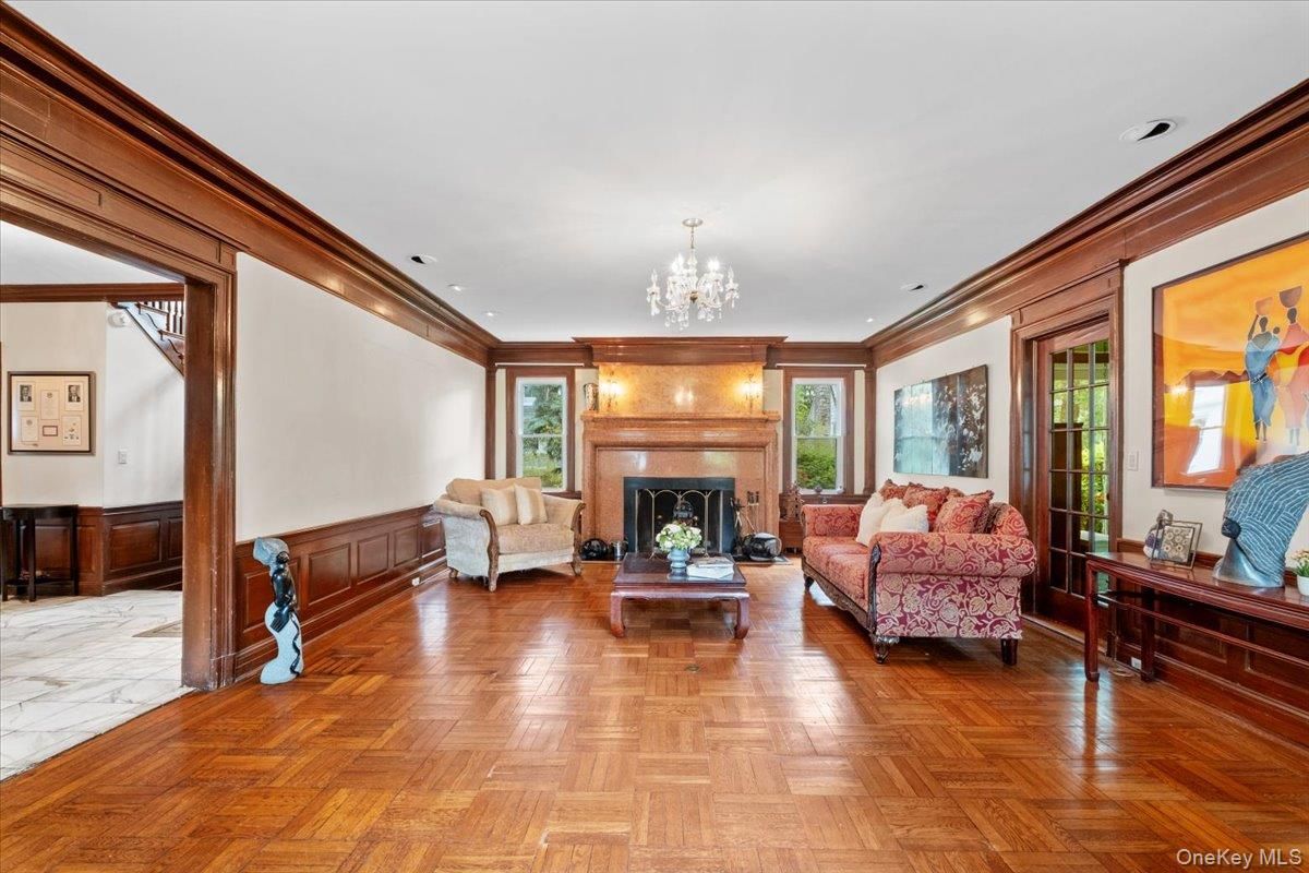 Chandelier, Fireplace, Interior, Living room, Recessed Lighting, Wood Texture Flooring