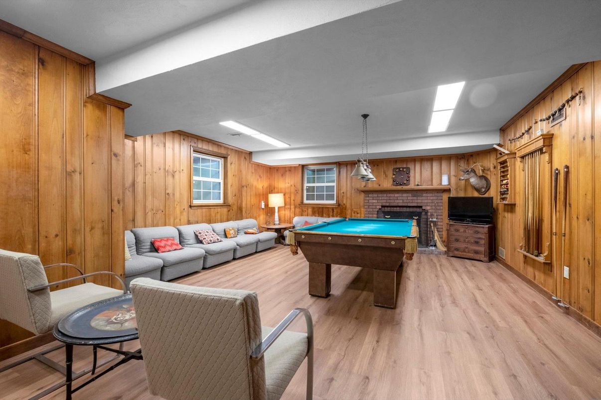 Billiard Table, Fireplace, Game Room, Interior, Living room, Pendant Lights, Wood Texture Flooring, Wooden Walls