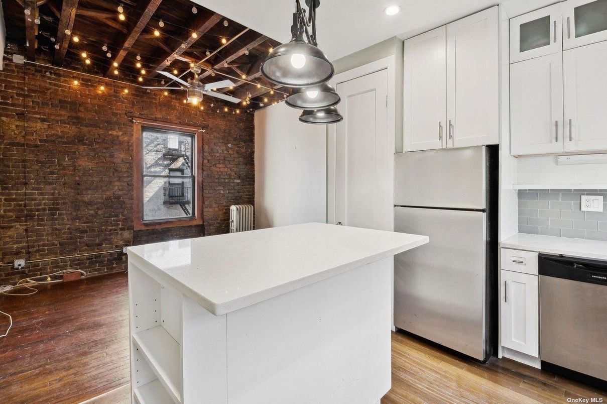 Interior, Kitchen, Pendant Lights, Recessed Lighting, Stainless Steel Appliances, Stone Walls, Wood Texture Flooring