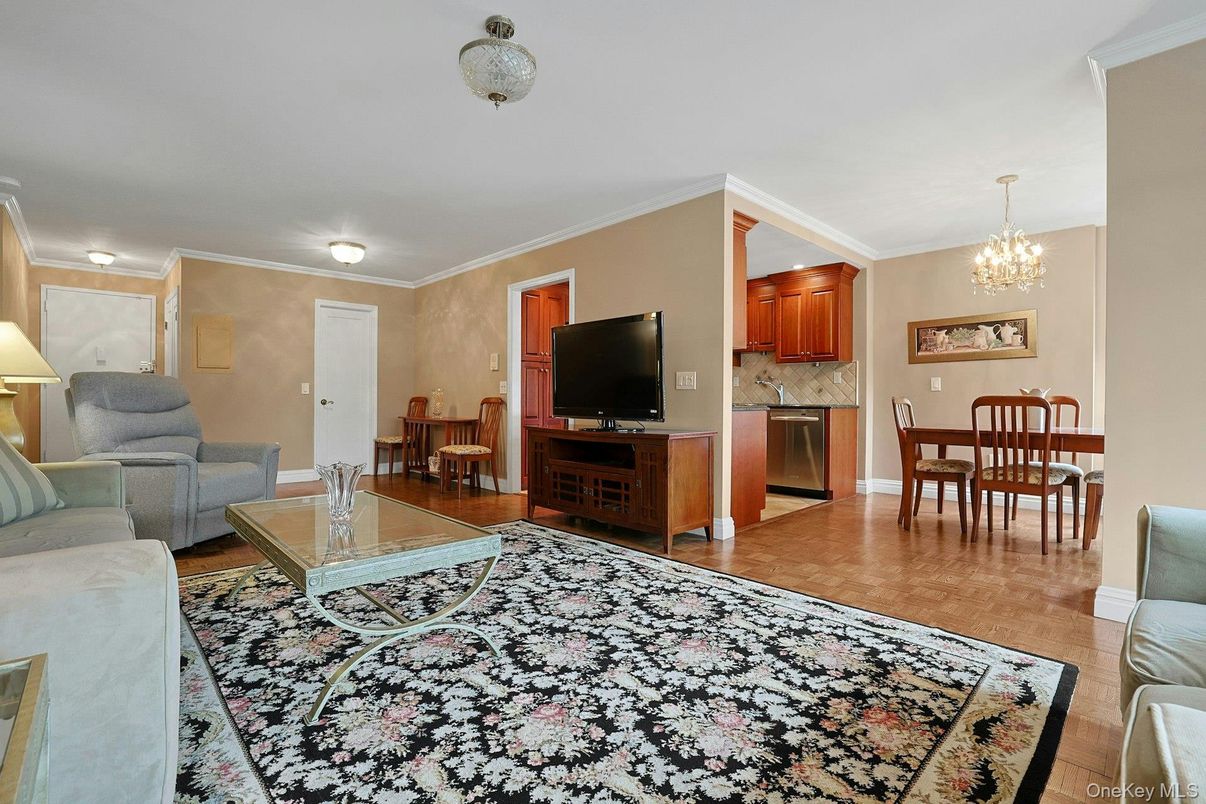 Chandelier, Dining room, Interior, Kitchen, Living room, Stainless Steel Appliances, Wood Texture Flooring
