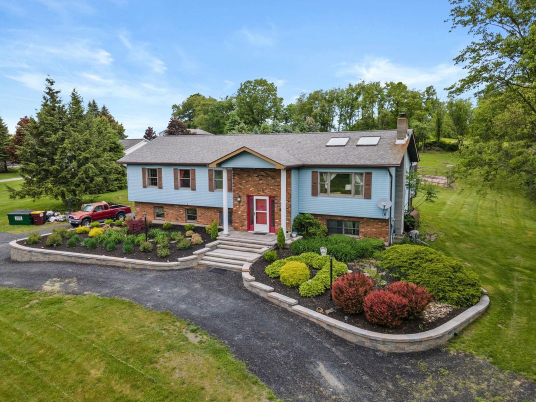 Exterior, Facade, Brick Facade, Raised Ranch