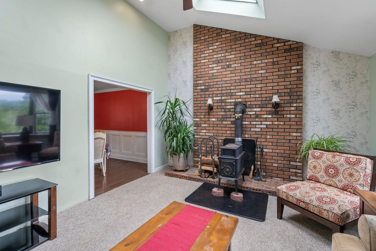 Fireplace, Interior, Recessed Lighting, Stone Walls, Wood Texture Flooring