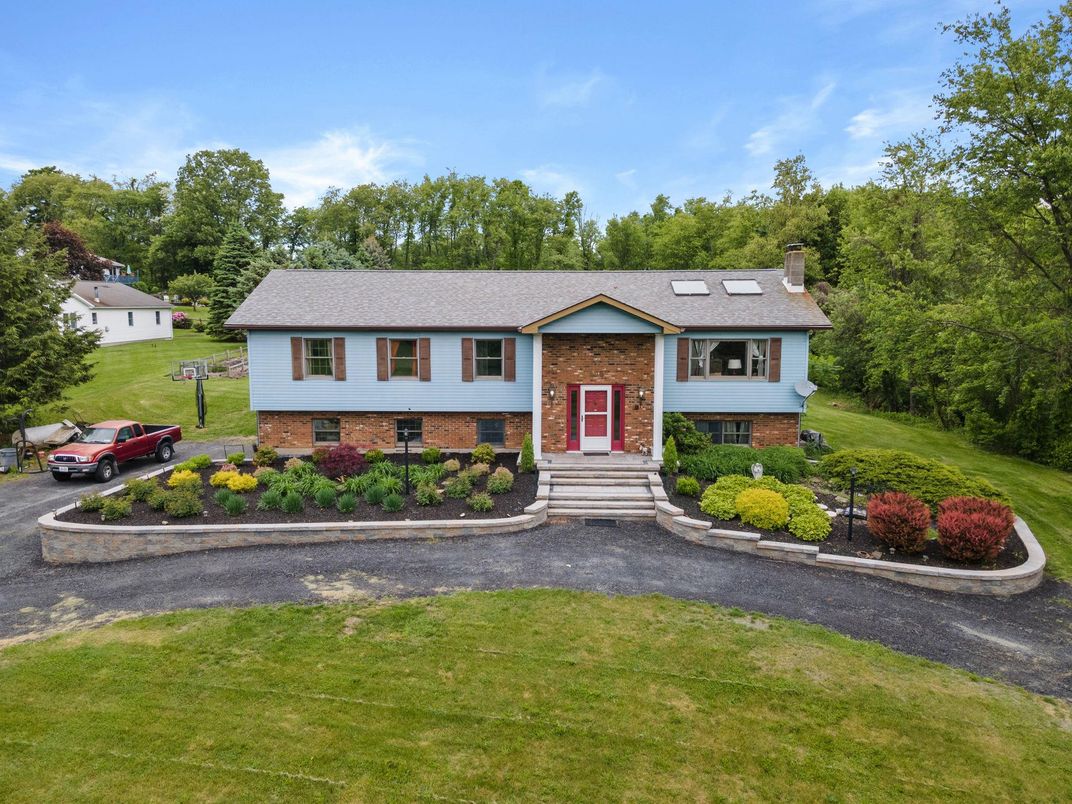 Exterior, Facade, Brick Facade, Raised Ranch