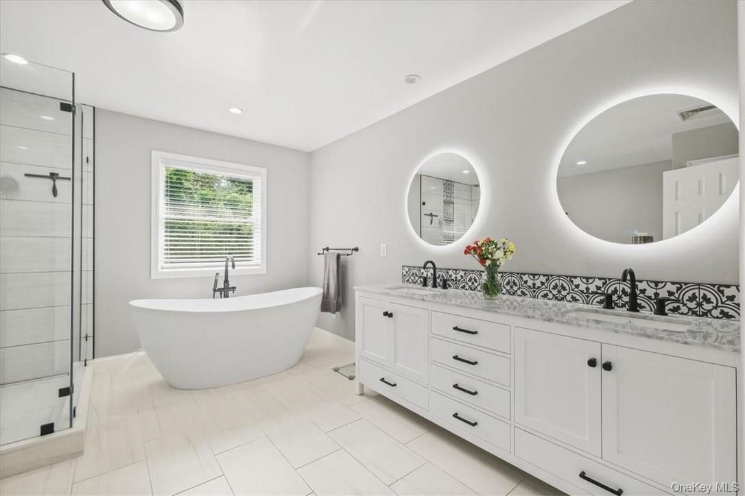 Bathroom, Dual Sink Vanities, Free Standing Baths, Glass Shower, Interior, Recessed Lighting