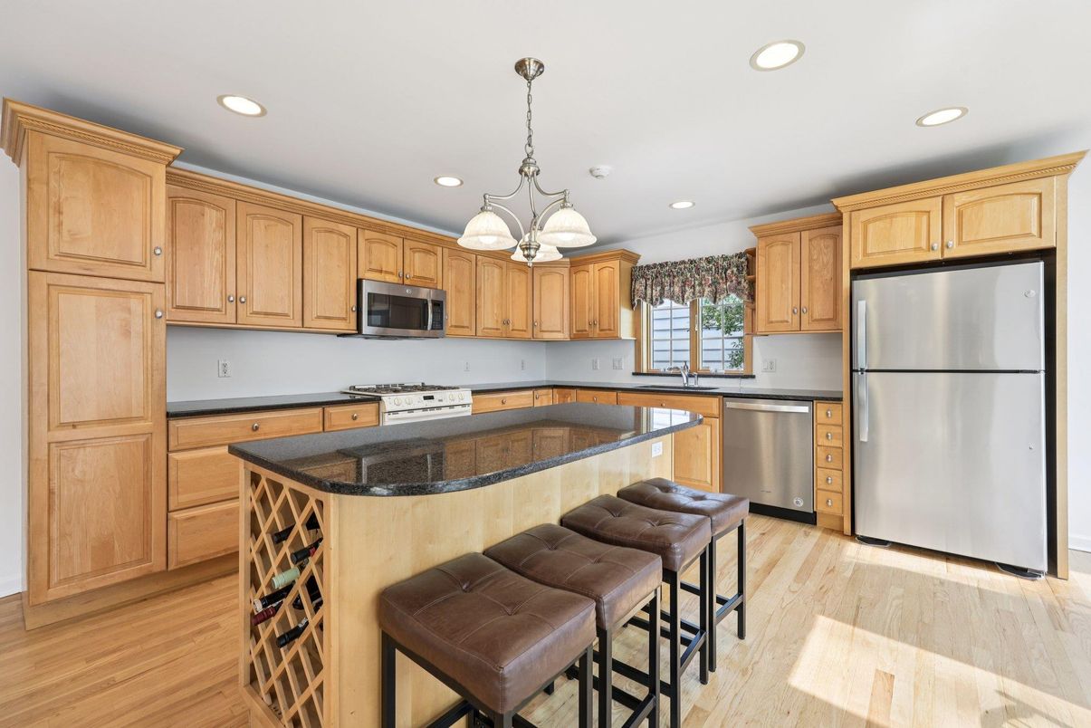 Chandelier, Interior, Kitchen, Pendant Lights, Recessed Lighting, Stainless Steel Appliances, Wood Texture Flooring
