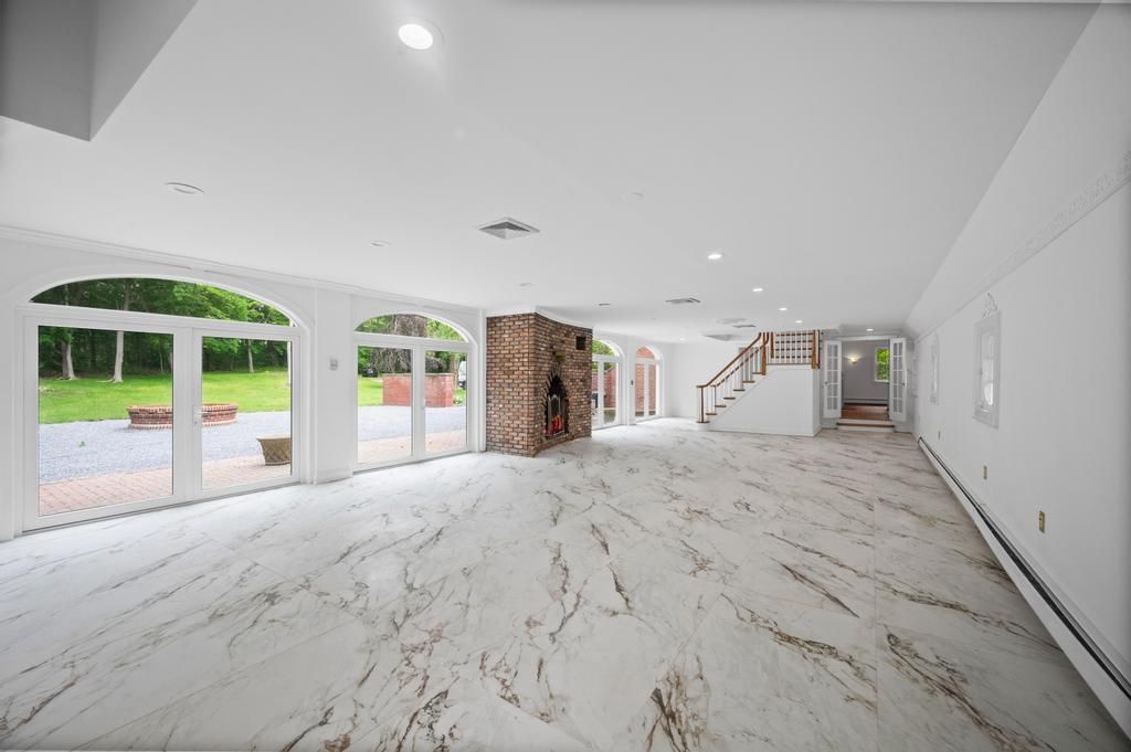 Empty room, Fireplace, Interior, Marble, Recessed Lighting, Stone Walls