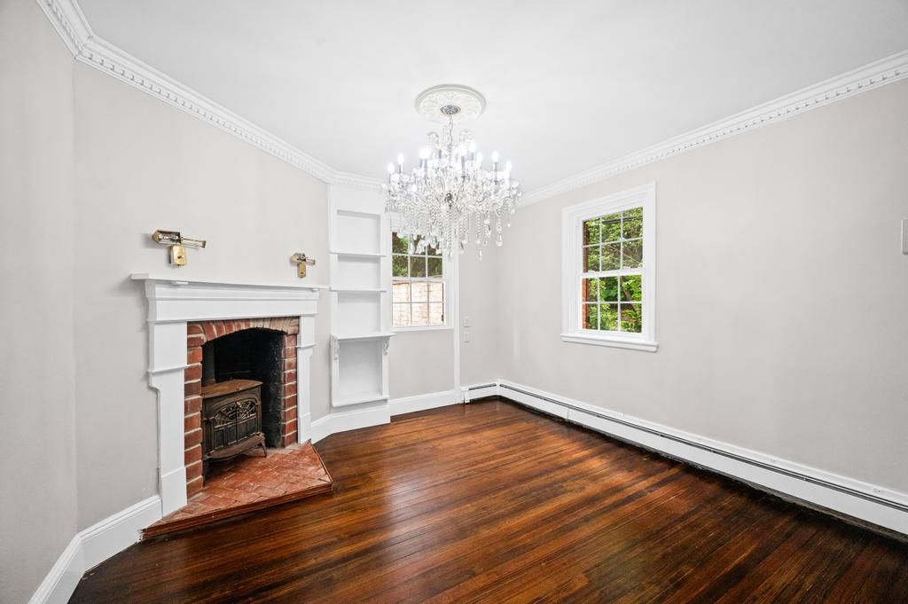 Chandelier, Empty room, Fireplace, Interior, Wood Texture Flooring