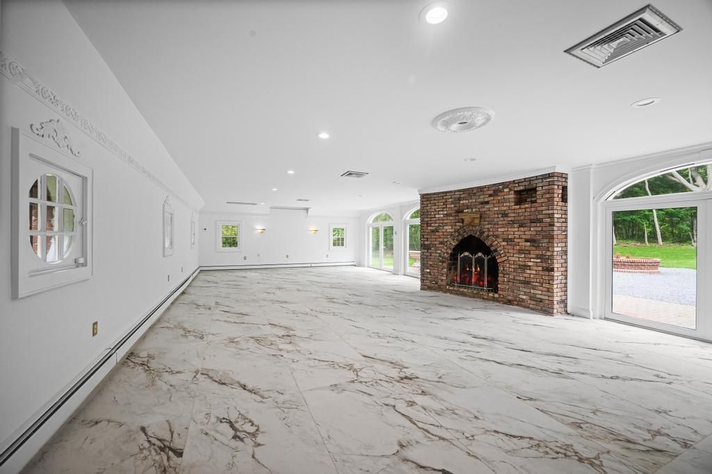 Empty room, Fireplace, Interior, Marble, Recessed Lighting, Stone Walls