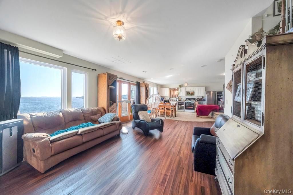 Dining room, Interior, Kitchen, Living room, Pendant Lights, Recessed Lighting, Water, Wood Texture Flooring