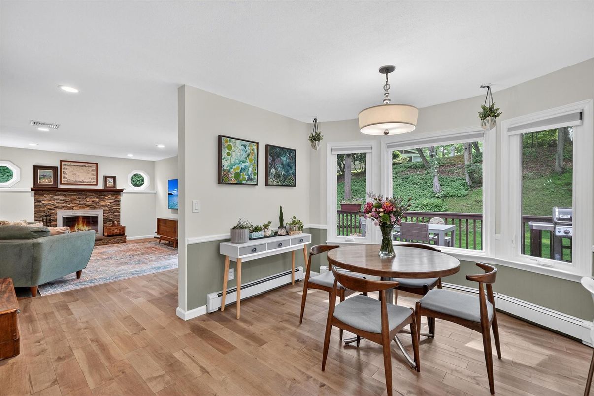 Dining room, Fireplace, Interior, Living room, Recessed Lighting, Wood Texture Flooring